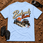 Backroads Social T-Shirt in Light Blue - side-by-side on a sunset trail through the pines, Tire Time Offroad