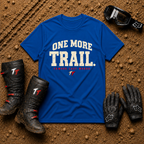 Royal blue One More Trail t-shirt with vintage varsity print and 'Famous Last Words' tagline — flat lay with muddy boots, goggles, and gloves, Tire Time Offroad
