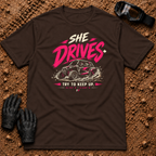 She Drives Try To Keep Up T-Shirt in Dark Chocolate - pink lettering over a woman driving a side-by-side UTV through dirt, Tire Time Offroad
