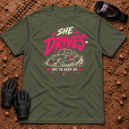 She Drives Try To Keep Up T-Shirt in Military Green - pink lettering over a woman driving a side-by-side UTV through dirt, Tire Time Offroad