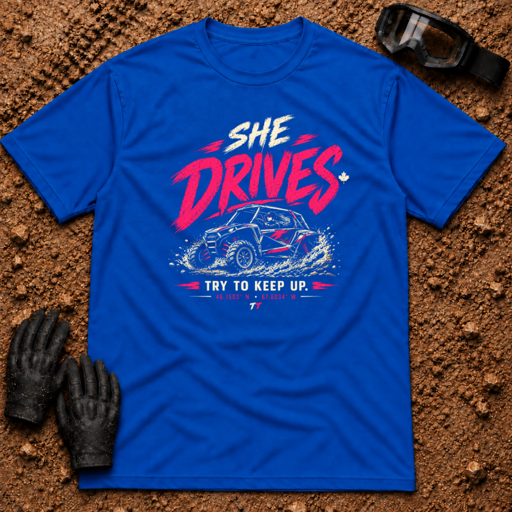 She Drives Try To Keep Up T-Shirt in Royal Blue - pink lettering over a woman driving a side-by-side UTV through dirt, Tire Time Offroad