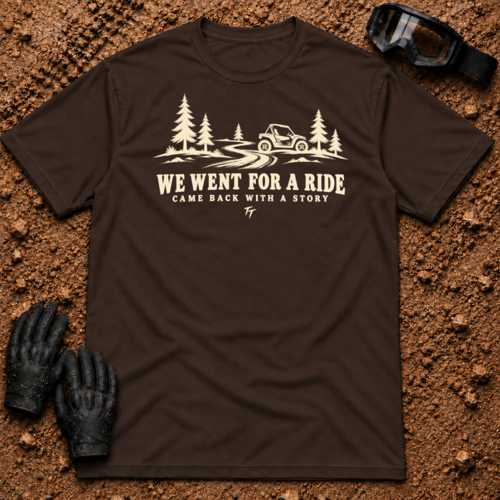 Dark Chocolate We Went For A Ride T-Shirt with a side-by-side on a winding pine trail and Came Back With A Story tagline — Tire Time Offroad ATV/UTV tee