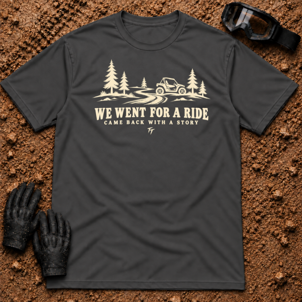 Dark Heather We Went For A Ride T-Shirt with a side-by-side on a winding pine trail and Came Back With A Story tagline — Tire Time Offroad ATV/UTV tee