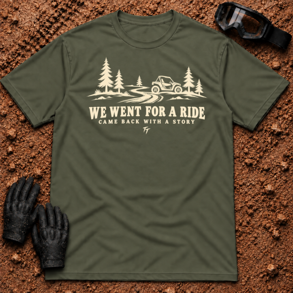 Military Green We Went For A Ride T-Shirt with a side-by-side on a winding pine trail and Came Back With A Story tagline — Tire Time Offroad ATV/UTV tee